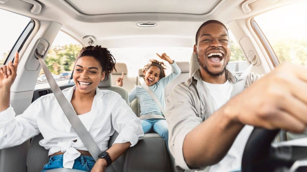 Family driving short commute in car